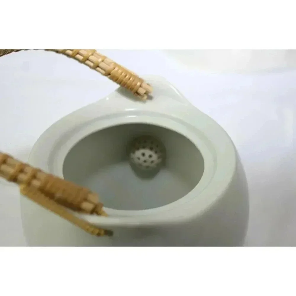 White Japanese bamboo handle tea pot 5in wide 5in tall